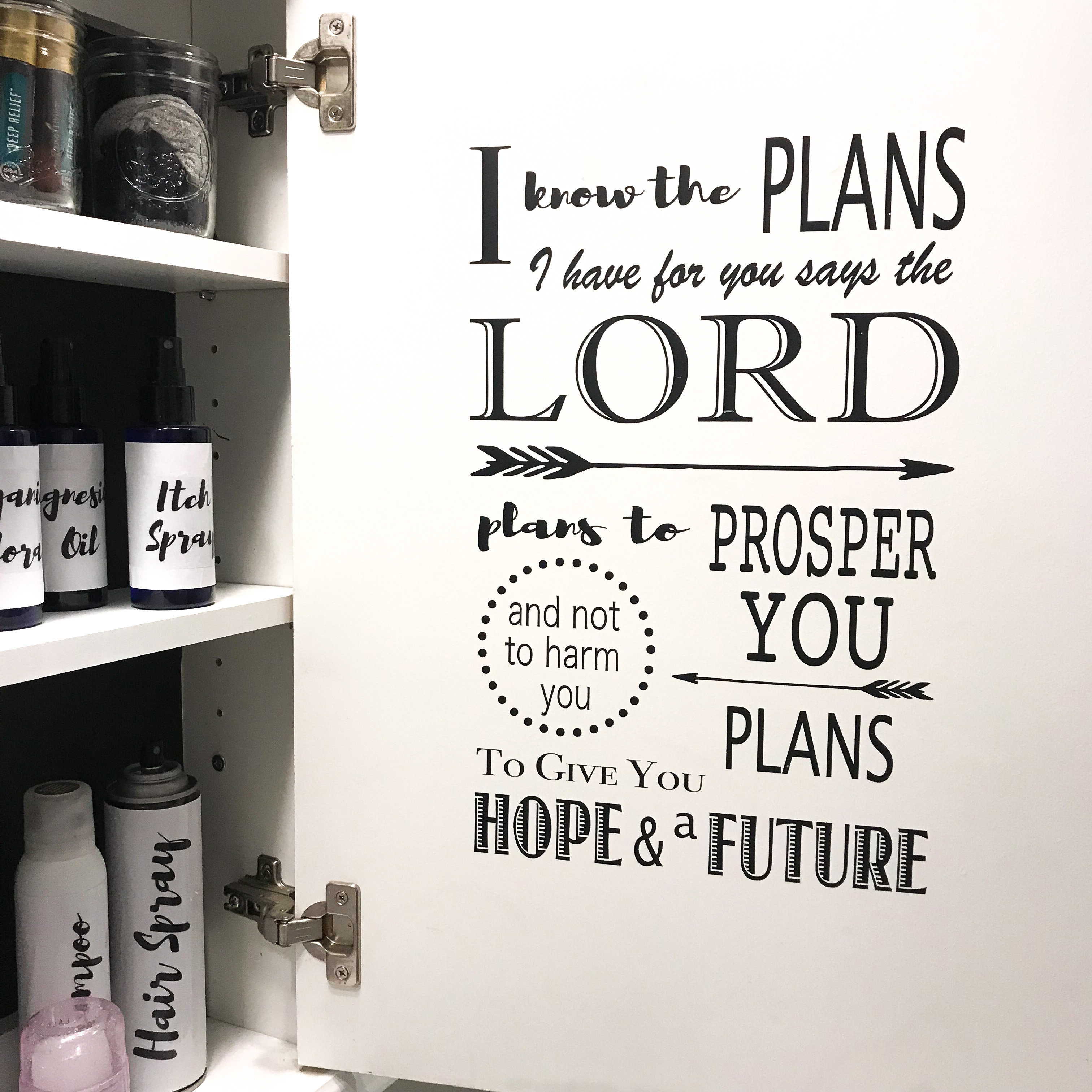 medicine cabinet with a bible verse inside the door as a daily reminder